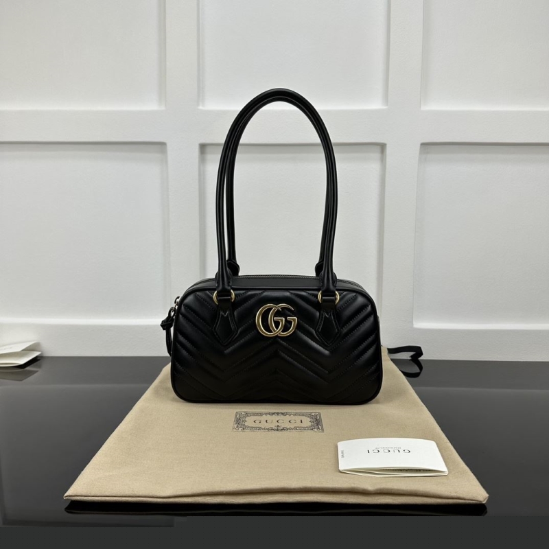 G*u*i top handle bags